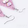 Pendientes de estilo étnico bohemio de venta caliente transfronteriza, pendientes encantadores de cuentas de arroz japonesas con circonita, pendientes de borlas tejidas a mano para mujer