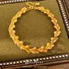 Pulsera de corazón cepillado con circonita chapada en oro real de 24 quilates, pulsera de nicho de lujo ligero de alta gama, joyería exquisita y elegante para mujer
