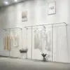 Tienda de ropa para mujer, estante de exhibición plateado, perchero de pared, perchero de pie, perchero de moda para colgar de lado
