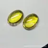 Zircônia sintética cabochão oval, cor verde-oliva dourado, gema oval de fundo plano, em estoque para atacado
