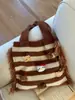 Bolsa de Punto de Gran Capacidad para Mujer 2025 Otoño e Invierno Nuevo Diseño Bolso Tote de Hombro Calado Ropa de Trabajo Versátil Bolsa de Playa