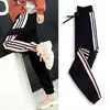 Pantalones de harén estudiante mujer hermana mayor pantalones deportivos pantalones holgados mujer estilo coreano negro talla grande Harajuku ajustados pantalones casuales