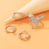 Joyería de comercio exterior de Amazon anillo creativo de mariposa geométrica de metal pesado personalidad irregular juego de cuatro anillos