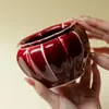 Jarra de Té de Cerámica de Alta Gama con Diseño de Mano de Buda Esmaltada en Horno Rojo para Uso Doméstico, Accesorios de Contenedor de Agua para Té de Lujo Ligero
