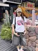 Camiseta de Manga Corta de Algodón Puro 2025 Verano Nuevo Estilo Letras Estampadas Hombro Derecho Cuello Redondo Pequeño Blanco t Delgado Delgado Top para Mujer