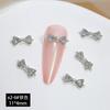 Lazo de Caligrafía Roja Pequeña Arte de Uñas Joyería Uso Armadura Accesorios Aleación de Oro y Plata Pila Taladro Decoración de Uñas Taladro Venta al por Mayor