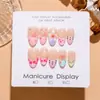 T875 Flor Transparente y Rosada Almendra Corta Pedrería Nude Francés Uñas Postizas 3D Estilo Suave Colorete Manicura Puntas de Uñas
