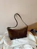 Bolso hobo de mezclilla azul vintage para mujer 2025 nuevo nicho patchwork de un solo hombro color block tipo almohada versión coreana