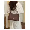 Bolso vintage de gran capacidad transfronterizo para mujer, nuevo bolso cruzado casual versátil de otoño 2026, bolso de hombro de lona para debajo del brazo