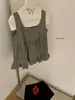 Wgwe9097 Ropa de Mujer Guangzhou Shisanxing Verano Nueva Camisa sin Mangas con Parche de Volantes a Cuadros y Tirantes de Moda