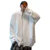 Nuevos suéteres de punto para otoño e invierno para hombres y parejas, chaquetas cárdigan con agujeros, estilo callejero europeo y americano de moda, venta al por mayor de fábrica transfronteriza
