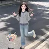Conjunto de Primavera y Otoño para Niñas 2026 Nuevo Estilo Camiseta Falsa de Dos Piezas Infantil Moda de Niña Conjunto de Dos Piezas de Otoño Tendencia