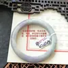Artículo ÚnicoJadeíta Grado A, Fino y Suave, Humectado, Morado Claro Violeta con Patrones Florales, Pulsera de Círculo Completo, Tallas 51 a 61