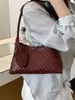 Bolso de axila tejido a mano de estilo coreano de nicho transfronterizo para mujer, bolso de mano casual de moda, bolso de cubo de hombro de gran capacidad
