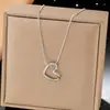 Nuevo Collar Hueco con Forma de Corazón de Nicho para Mujer, Colgante Estilo Ins, Aretes, Pulsera, Diseño Simple, Conjunto Versátil en Estilo Japonés y Coreano