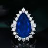 Zhenrong Nuevo Venta Caliente Transfronteriza Europea y Americana Incrustado Microincrustado Gota de Agua Forma de Pera Imitación Esmeralda Natural Anillo de Compromiso en Vivo
