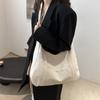 Bolso de mano informal sencillo de estilo japonés para mujer, bolso cruzado de hombro ligero con diseño de nicho de gran capacidad para estudiantes.