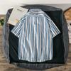 Camisa listrada de manga curta para o verão masculina estilo coreano moderna bonita solta estilo japonês moderna moderna estilo Hong Kong casaco superior