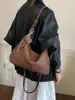 Tendência minimalista transfronteiriça outono 2026 nova moda bolsa de trabalho feminina casual personalizada bolsa de ombro transversal