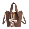 Bolsa Saco Textura Retrô Estilo Coreano para Mulheres Outono e Inverno 2025 Nova Nicho Luxo Acessível Versátil Estilo Estrangeiro Bolsa de Ombro Único Transversal