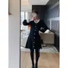 Vestido Negro de Manga Larga Estilo Hepburn para Mujer, Otoño e Invierno 2025 Nuevo Punto de Moda de Alta Gama Falda Retro de Línea A