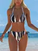 Traje de baño bikini de color liso europeo y americano, sexy y moderno bikini de tres piezas, nuevo modelo 2027, trajes de baño al por mayor para vacaciones en la playa