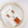 Nuevo especial transfronterizo explosión de tendencia europea y americana titanio acero alta calidad color collar pendientes traje femenino joyería de concha real
