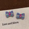 Brincos Coloridos com Laço Design Retrô de Nicho para Mulheres Novo Estilo 2025 Brincos Elegantes de Luxo Leve