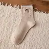 Calcetines lindos de oso bordado hasta la pantorrilla para mujer, estilo universitario dulce de otoño e invierno, calcetines de algodón holgados de dibujos animados sin costuras para niñas