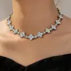 Collar de trébol de cuatro hojas de 15 mm transfronterizo hip-hop aleación diseño hueco moda full diamond europeo y americano venta al por mayor de fábrica