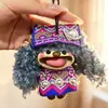Encantador perrito peludo con la lengua fuera, llavero para bolso, colgante de dibujos animados natural, semillas de terapia de sonido curativas, popular en zonas escénicas, amuleto divertido y adorable