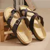 Suministro de Fábrica 2026 Nuevas Chanclas de Corcho para Mujer Sandalias de Moda para Hombre Zapatos de Playa para Pareja En Stock Venta al por Mayor