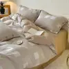 Juego de cuatro piezas de algodón y lino de color liso Clase A, funda de edredón jacquard abotonada simple de algodón puro, sábana, sábana bajera, ropa de cama para todas las estaciones
