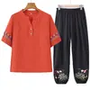 El atuendo de verano de mamá es elegante y moderno, un nuevo top casual holgado de manga corta de verano para mujeres de mediana edad y mayores