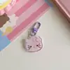 Nuevos accesorios de llavero de cabeza de gato KT de color caramelo transparente para primavera y verano, lindo colgante de corazón de chica Joker para mochila, venta al por mayor