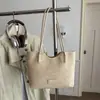 Bolso Coreano de un Hombro Gran Capacidad Bolso Tote de Moda Nuevo Estilo 2026 Textura Tejida Personalizada Bolso de Mano para el Hombro para el Trabajo