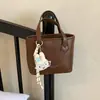 Bolso de Mano de Moda para Mujer Estilo Ins 2026 Verano Nuevo Modelo Bolso de Hombro Cruzado Personalizado Color Sólido Bolso Cubo de Moda