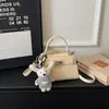 Bolsa de mano pequeña estilo coreano Ins para mujer, Novedad Primavera/Verano 2026, Bolso versátil de un solo hombro para el día a día, Bolso cruzado de diseño nicho