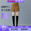 Falda de mujer hecha a medida para otoño e invierno 2026, versátil falda bodycon de línea A adelgazante, minifalda de cuero PU de cintura alta