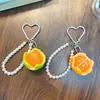 Llavero Cadena Perla Naranja Azúcar Colgante Bolsa Pequeña de Resina Fruta Pequeña Simulada de Verano Pequeño Regalo Al por Mayor