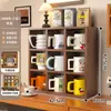 Portavasos de nueve compartimentos, organizador para tazas y tazas de té, estante de almacenamiento multicapa simple, soporte de exhibición para figuras y adornos, estante de exhibición multifuncional