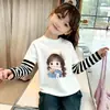 Camiseta base de algodón puro para niñas, estilo fino de primavera y otoño, con retazos, estilo coreano moderno, linda y divertida, de dibujos animados, cuello redondo, manga larga
