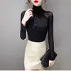 Nuevo Estilo Otoño e Invierno 2025 Camisa Básica Negra de Malla con Lentejuelas y Cuello Alto de Manga Larga para Mujer con Terciopelo Ajustado y Top Sexy