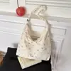 2026 Nova Bolsa de Lona Grande Capacidade Estilo Coreano Fofa e Fresca Versátil Bolsa de Mão para o Dia a Dia Bolsa de Ombro Cruzada para Mulheres