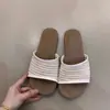 Sandalias tejidas huecas de estilo bohemio para mujer Verano 2025, Pantuflas planas de suela suave para vacaciones y uso en exteriores