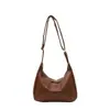 Bolso de axila para mujer modelo nuevo 2026 transfronterizo, bolso de hombro para mujer versátil de moda de alta gama, estilo casual vintage de otoño e invierno