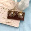 Brincos de Tarraxa com Pétalas de Flor de Strass em Metal Europeu e Americano Estilo Moda Festa Vazados Brincos de Tarraxa Fornecimento Transfronteiriço Feminino