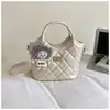 Bolso bandolera nuevo y moderno para ir al trabajo, bolso de mano, bolso de moda, bolso tipo cubo de primavera, bolso sencillo para mujer, diseño exclusivo acolchado