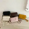 2026 Verano Nuevo Estilo Coreano Gama Alta Color Sólido Cuadrado Pequeño Bolso de Hombro Elegante para Mujer Bolso Cruzado Simple de Moda Tendencia