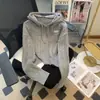 Suéter largo de punto holgado con capucha y manga larga para mujer, chaqueta corta de punto ajustada para mujer petite en color blanco roto